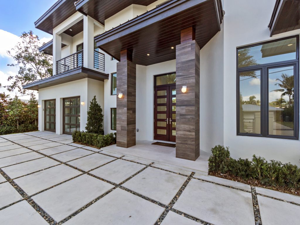 Impact windows on a modern Boca Raton facade